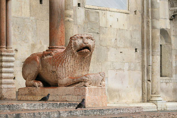istock Lion at side entrance, Cathedral of Modena 173550967