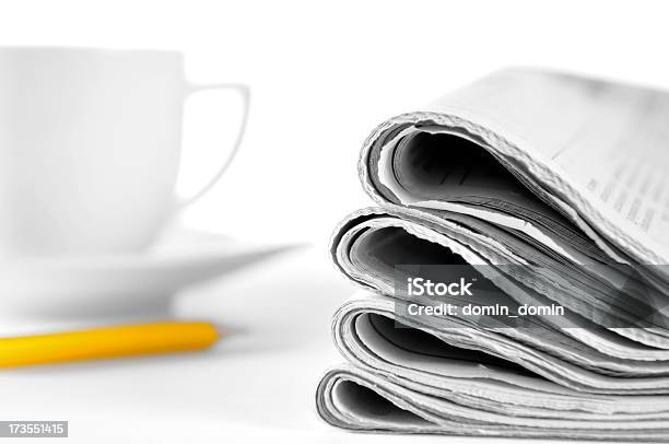Morning News Stack Of Newspapers Coffe Cup Pencil On Table Stock Photo - Download Image Now