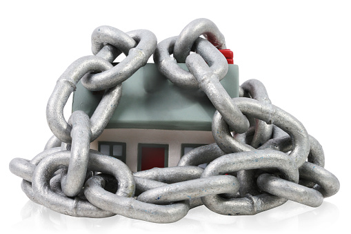 Enchained house on a white background.