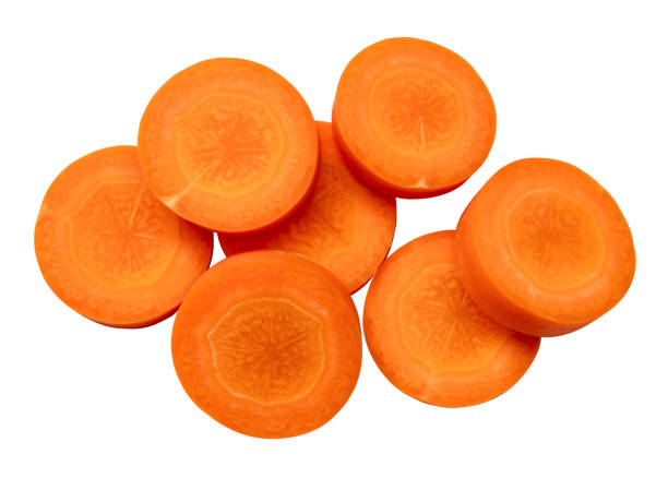 istock Fresh beautiful carrot slices in stack isolated on white background witch clipping path. Top view and close up 1735530534