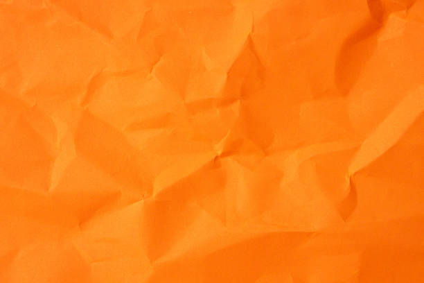 istock Orange crumpled paper texture used for paper background texture in decorative art work 1735531689