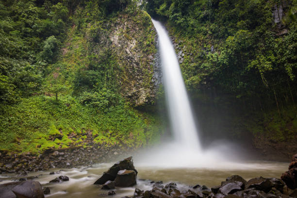 istock Fortuna waterfall in Arenal Volcano National Park (Costa Rica) 1735552468