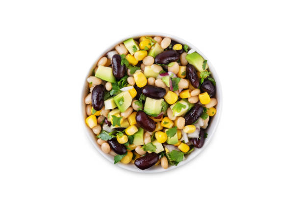 istock White beans kidney beans corn avocado salad in a bowl on a white isolated background 1735555095