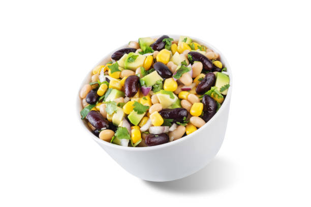 istock White beans kidney beans corn avocado salad in a bowl on a white isolated background 1735555099