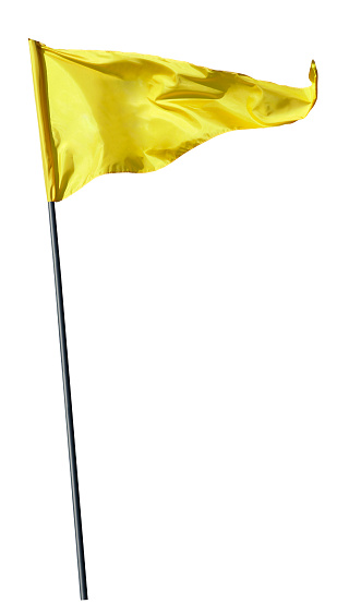 Amarillo bandera en bandera polos, Soplando en el viento photo