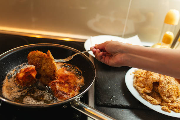 istock Close-up of making schnitzel 1735559919