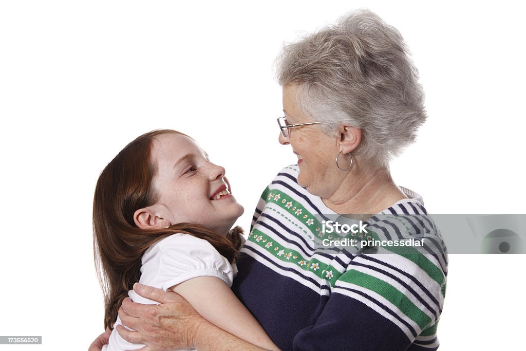 Happy Family Cute little girl hugging her Grandmother Child Stock Photo