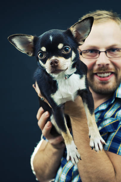 istock Man with his Chihuahua 173556842