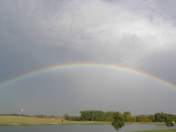Rainbow over Lake stock photo