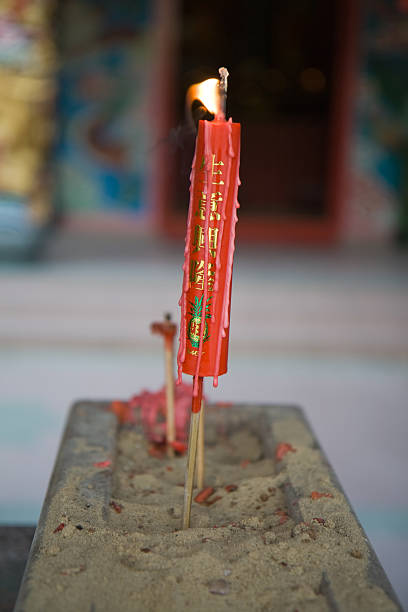 Candle in chinese temple stock photo