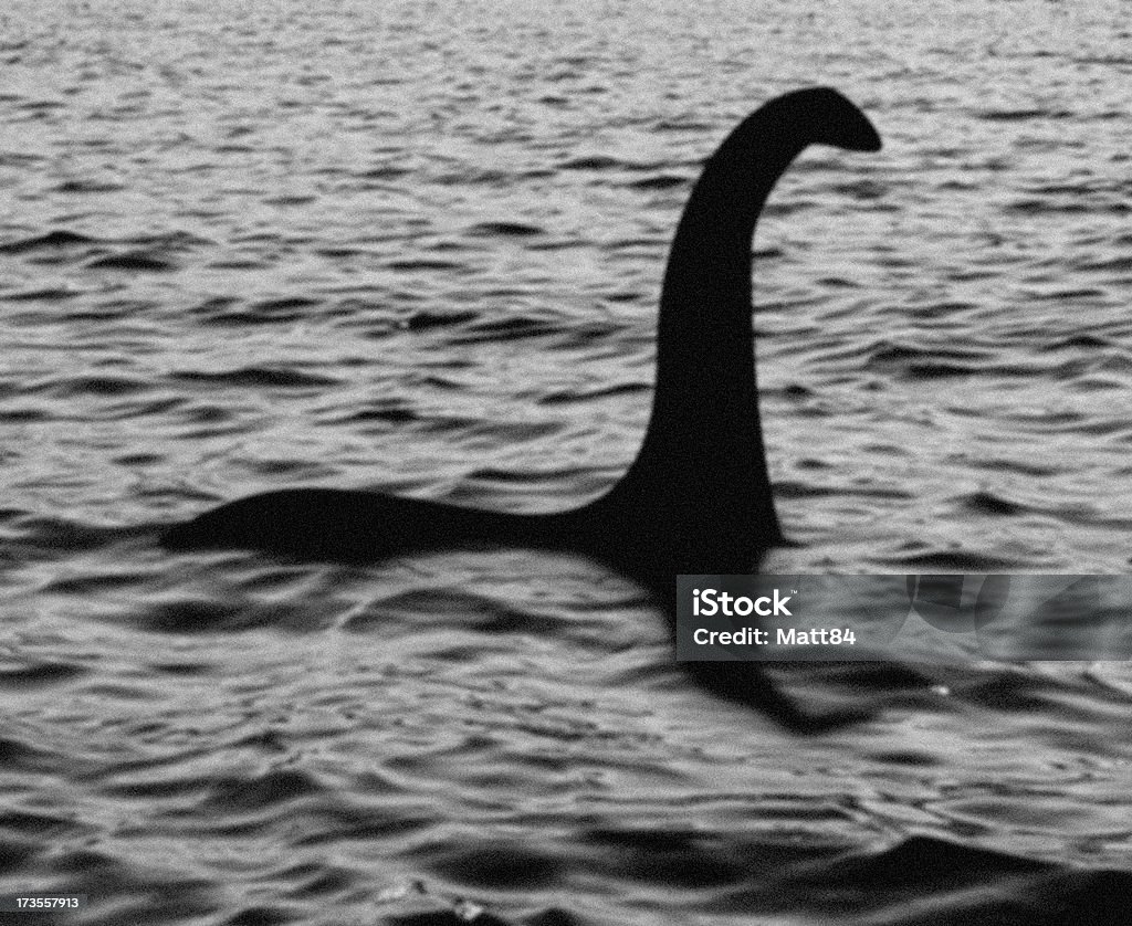 OBJECTS 11 Loch Ness Monster sighting!! The water is from one of my other images. Added noise and blur to make it look like the famous old hoax picture. Loch Ness Monster Stock Photo