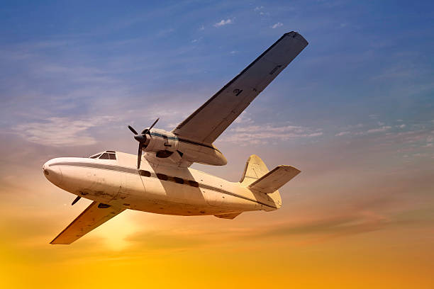 istock Antique propeller airplane at sunset 173558351