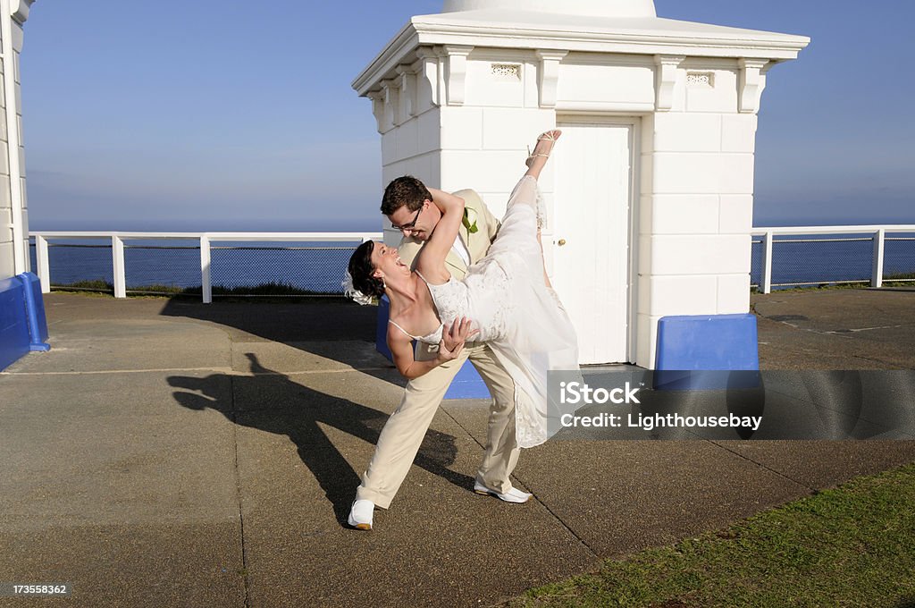 Let's dance baby! A newly married couple striking a dance pose Bride Stock Photo