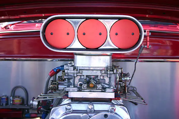 The air intake and carburators from a supercharged chevy.