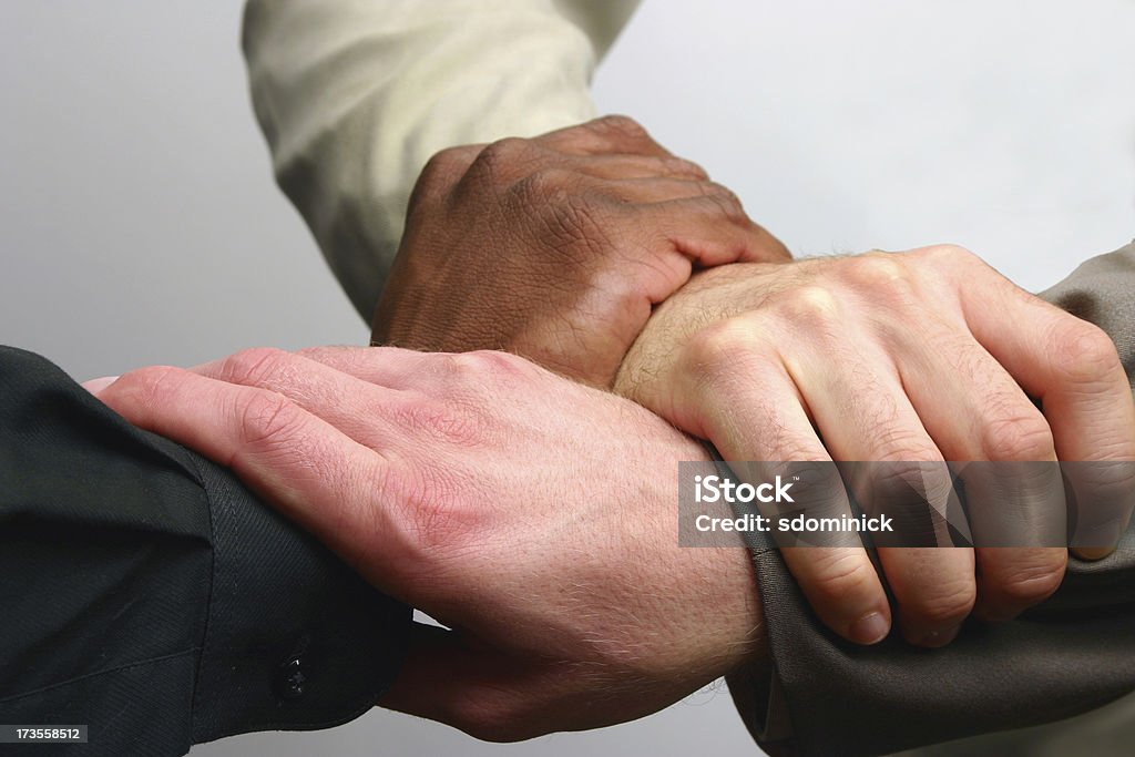 Teaming Up  Three People Stock Photo