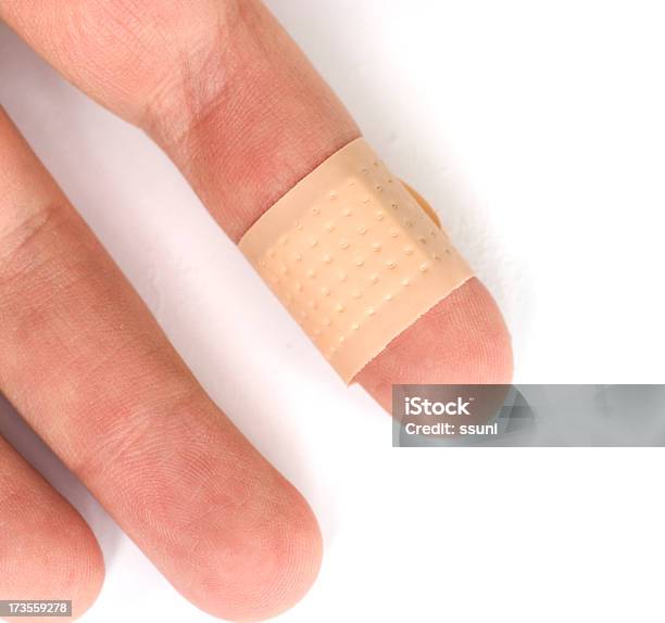 Bandage On Finger Stock Photo - Download Image Now - Bandage, Beaten Up, Bruise