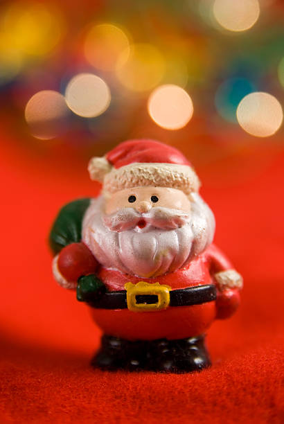 istock santa claus with christmas lights 173559676