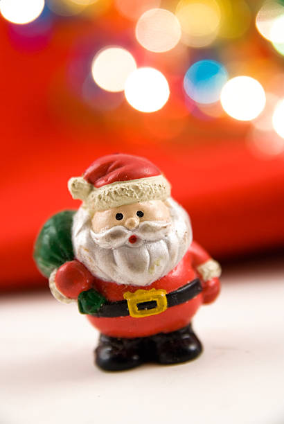 istock santa claus with christmas lights 173559681