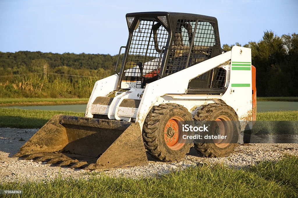 Bobcat cavadora mecánica cargador de - Foto de stock de Jaula libre de derechos