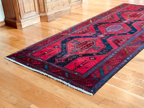 A Persian carpet or Persian rug is a heavy textile made for a wide variety of utilitarian and symbolic purposes and produced in Iran for home use, local sale, and export. Carpet weaving is an essential part of Persian culture and Iranian art.  Oriental rugs produced in this area stand out by the variety and elaborateness of its manifold designs.