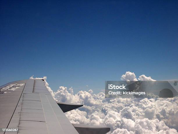 Flying Over Clouds Stock Photo - Download Image Now - Aircraft Wing, Airplane, Beauty In Nature