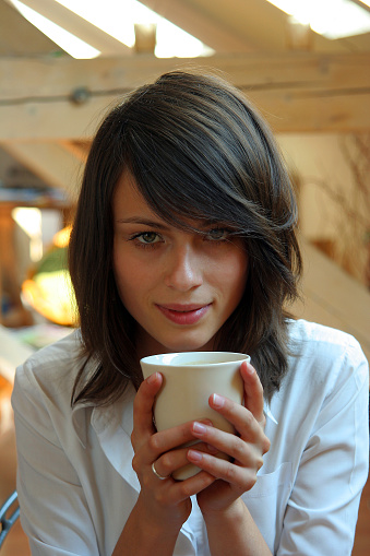 young girl with white cupwatch some more conected images: