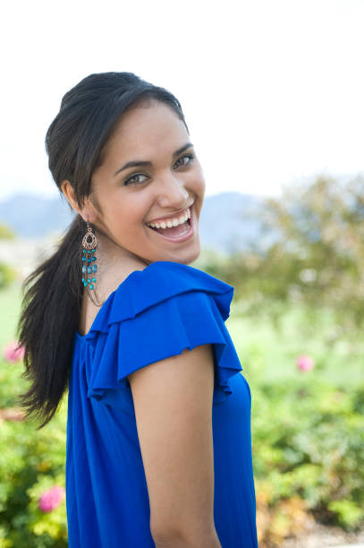 istock Beautiful young Hispanic woman outside 173563367
