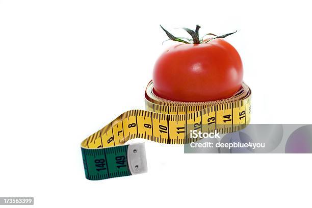 Tomatoe In A Measuring Tape Stock Photo - Download Image Now - Antioxidant, Balance, Beauty