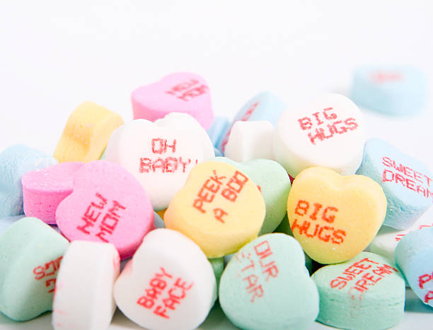 Candy with baby message stock photo