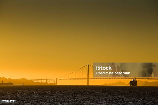 Ship Passing Under Golden Gate Bridge Stock Photo - Download Image Now - Bridge - Built Structure, California, Dusk