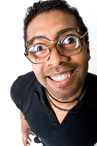 Funny guy with two glasses on the nose. His smile is ver stange;-) Taken in studio on white background.