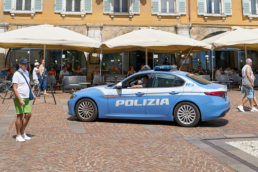 Riva del Garda, Italy – August 03, 2023: Police presence for public safety in the popular resort of Riva del Garda in Italy