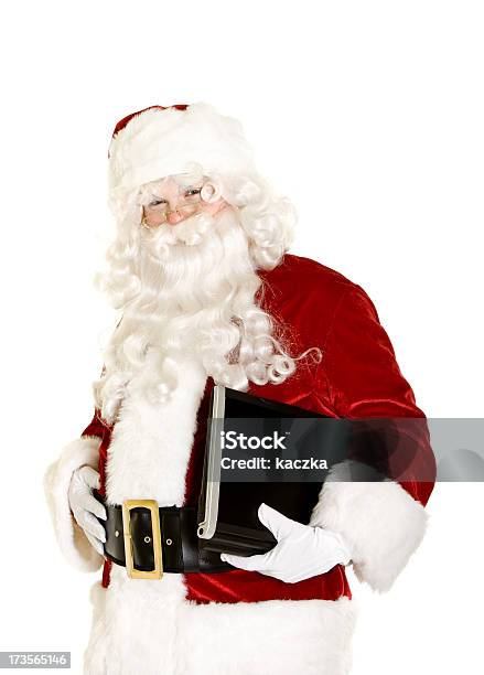 Foto de Papai Noel Com Laptop Isolado No Branco e mais fotos de stock de Adulto - Adulto, Adulto maduro, Alegria