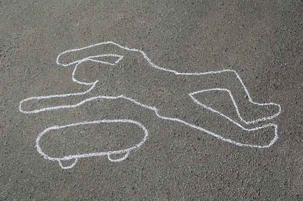 istock Chalk outline of dead skateboarder 173565274
