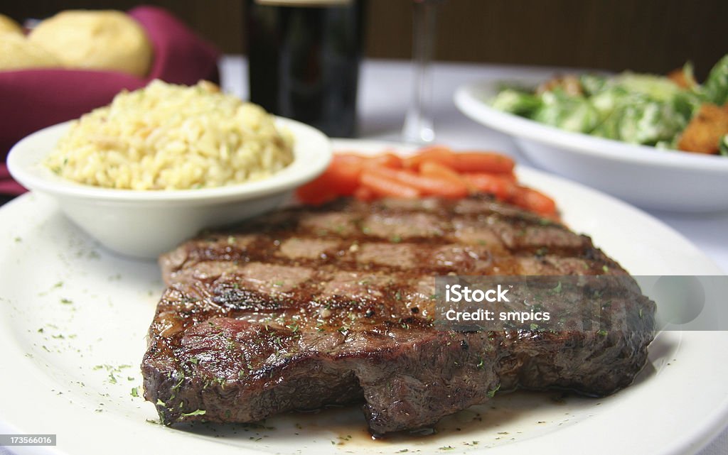 Cena di bistecca - Foto stock royalty-free di Bistecca di manzo