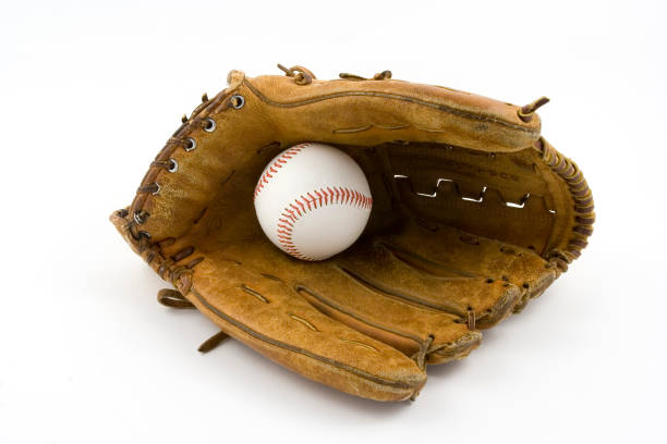 Baseball Glove Open with Ball A well worn baseball glove isolated on a white background with a baseball in the pocketOther images from the Baseball Series: leather pocket clothing hide stock pictures, royalty-free photos & images