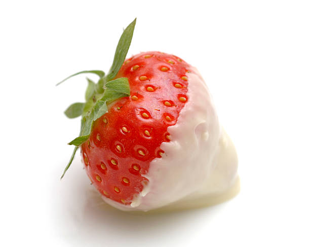 istock chocolate dipped strawberry against white 173566345