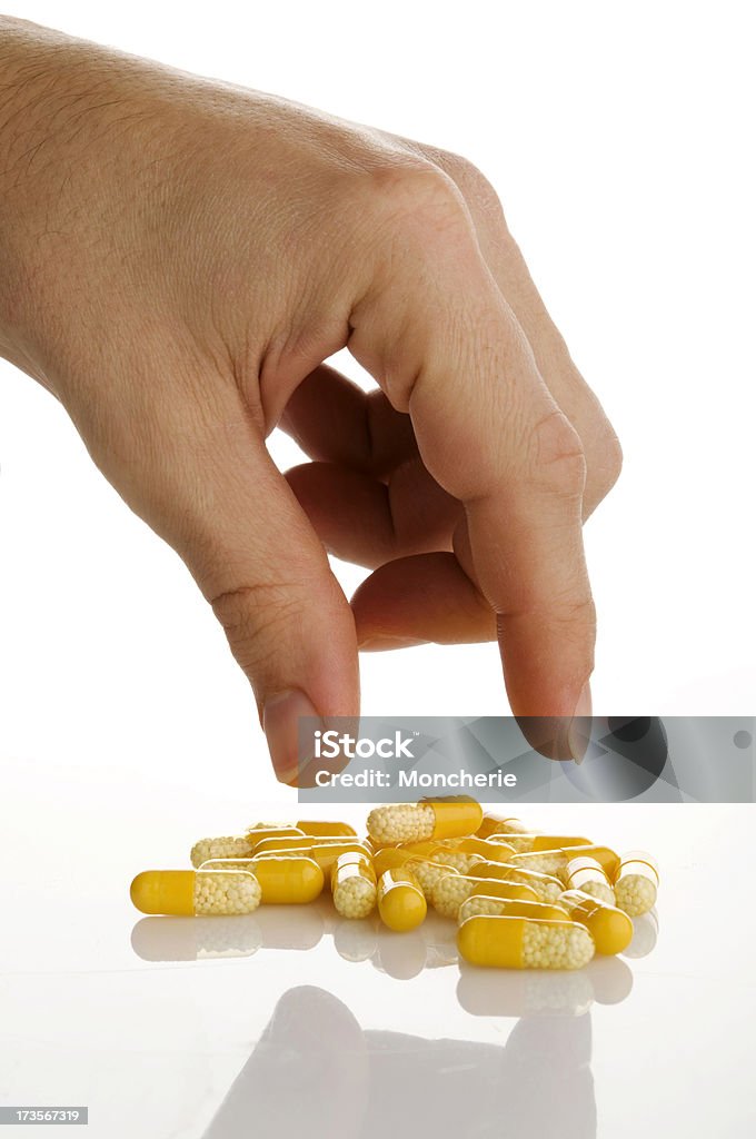 Prendre un médicament - Photo de Antibiotique libre de droits