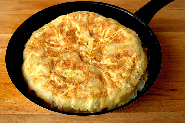 Tortilla in a pan Ready to serve.Spanish Food & Drink Lightbox: tortilla de patatas stock pictures, royalty-free photos & images