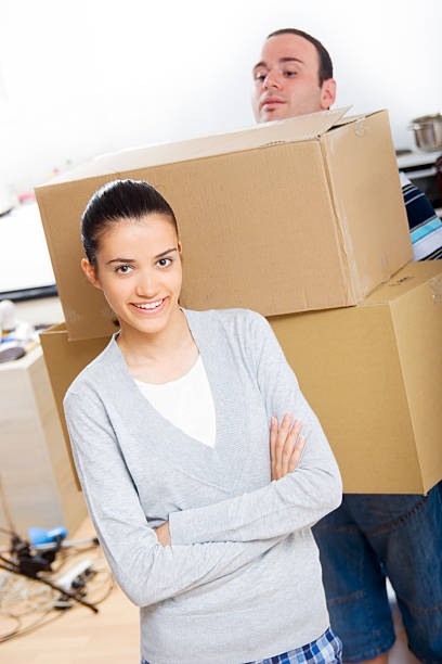 istock young couple moving in new house 173568308