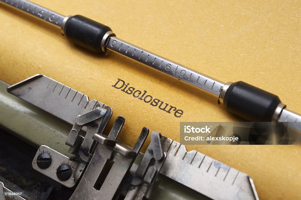 Disclosure form on typewriter DIsclosure form on typewriter Disclosure - Concept Stock Photo