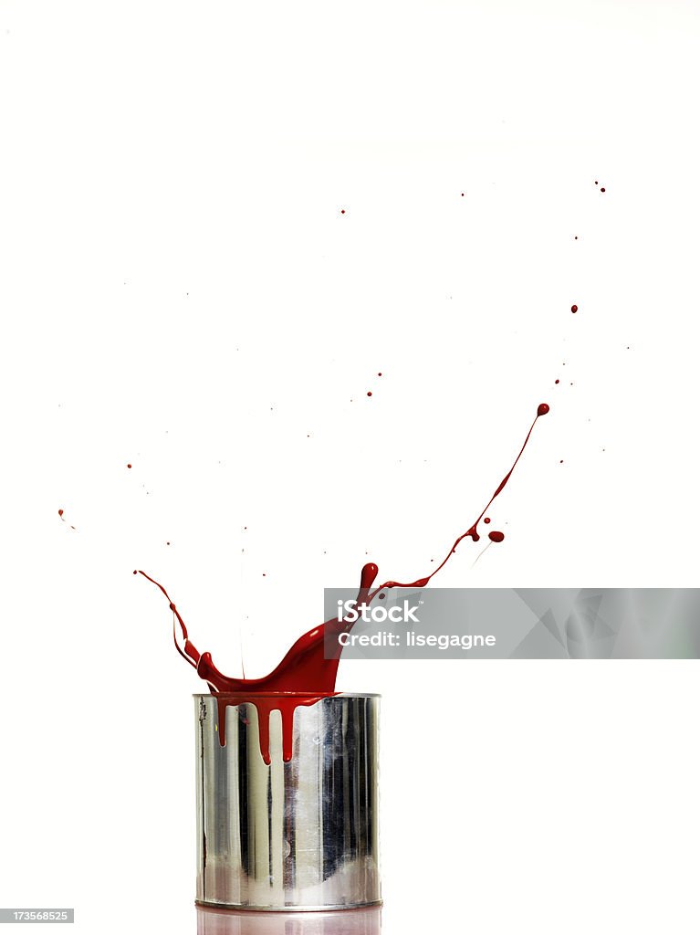 Splashing red paint Paint Can Stock Photo