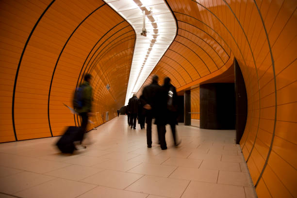 istock travellers in modern subway tunnel XL 173568939