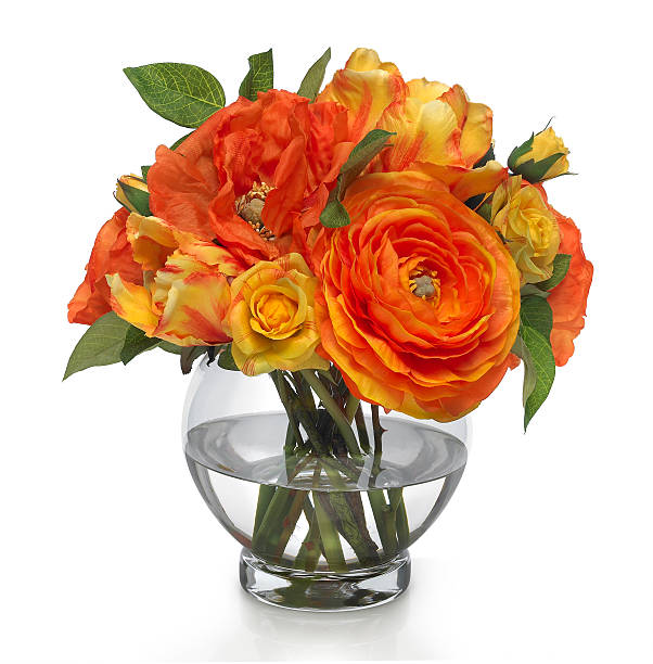 Orange poppy and ranunculus bouquet in footed rose bowl with reflection. The image has an embedded path to delete the reflection if desired. This arrangement was shot against a bright white background. Extremely high quality faux flowers.