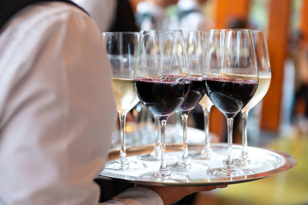 istock Red and white wine at a banquet 1735690863