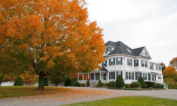 istock house and autumn trees 173569090