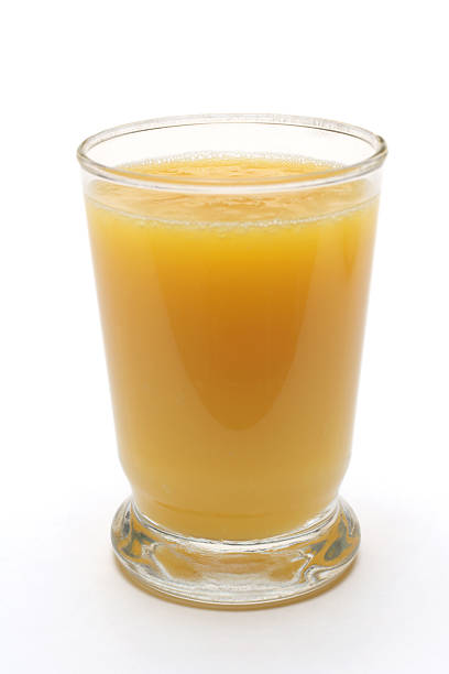 istock glass of orange juice 173569738