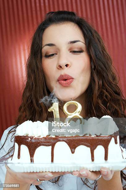 Teenage Girl Blowing Birthday Cake Candles Stock Photo - Download Image Now - 18-19 Years, Birthday Candle, Blowing