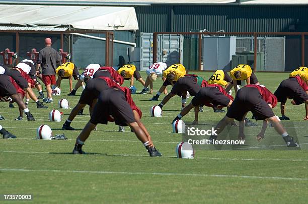 Football Practice Stretching Stock Photo - Download Image Now - American Football - Sport, Stretching, American Football Player