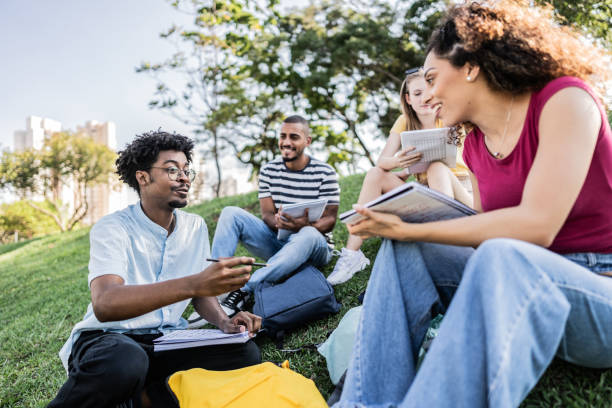 istock Student friends studying at university campus outdoors 1735703488